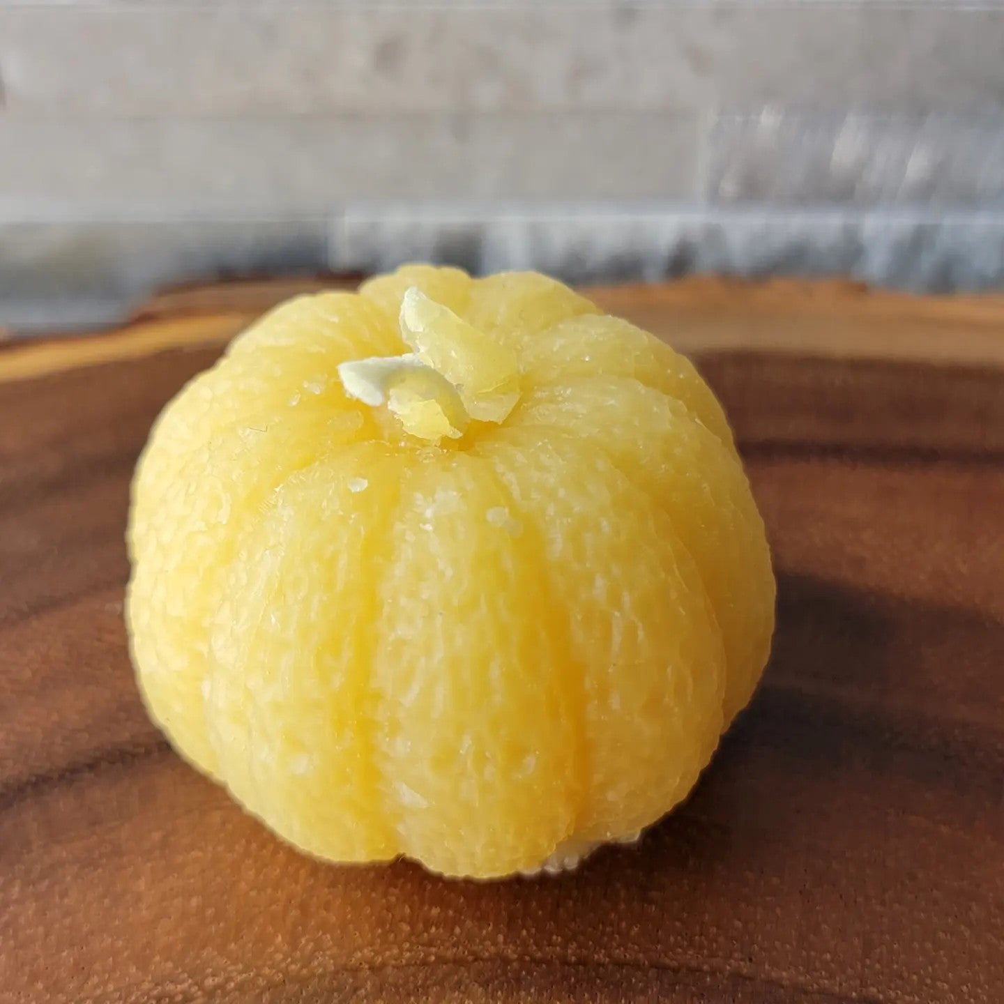 Pumpkin shaped bees wax candle